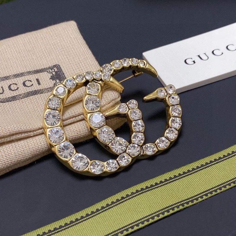 Gvc*1 brooches
